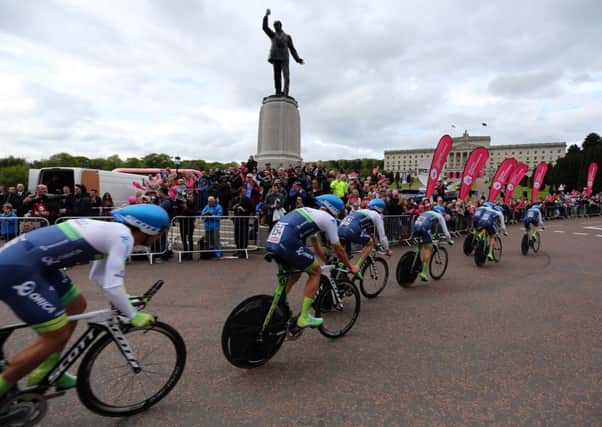 Orica GreenEdge enter the Stormont estate in Belfast during stage one of the Giro DItalia. Picture: PA
