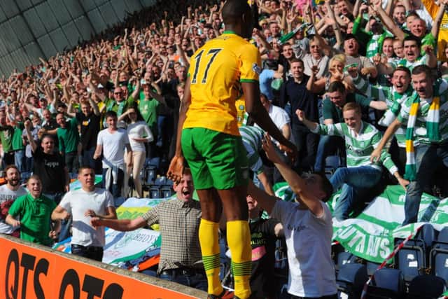 Amido Balde celebrates his first goal for Celtic last year - but Neil Lennon has told him he needs to 'improve dramatically'. Picture: Robert Perry