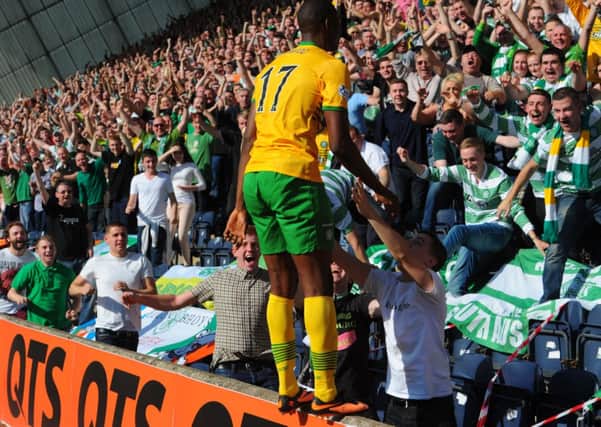 Amido Balde celebrates his first goal for Celtic last year - but Neil Lennon has told him he needs to 'improve dramatically'. Picture: Robert Perry