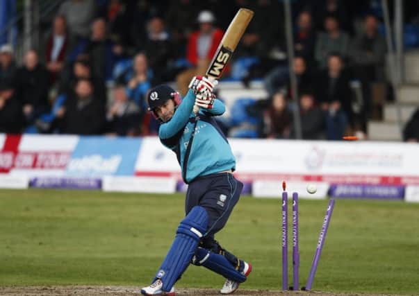 Scotland's Preston Mommsen is bowled against England. Picture: Reuters