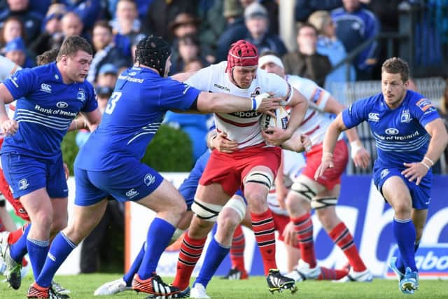 Grant Gilchrist is tackled by Leinsters Mike Ross. Picture: Matt Browne/Sportsfile