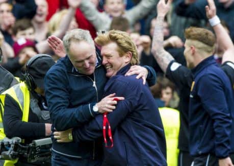 Motherwell manager Stuart McCall celebrates claiming second place in the table. Picture: SNS