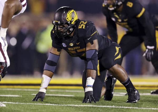 Michael Sam in action for University of Missouri Tigers; he will now be playing pro football. Picture: AP