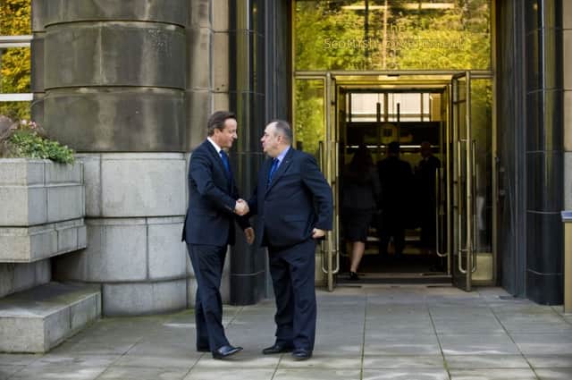 David Cameron signed off the Edinburgh Agreement with Alex Salmond becoming part of the independence story. Picture: Ian Georgeson