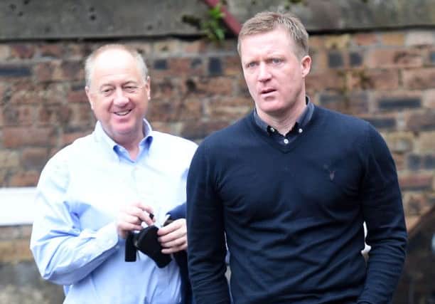 Gary Locke and Billy Brown leave Tynecastle. Picture: SNS