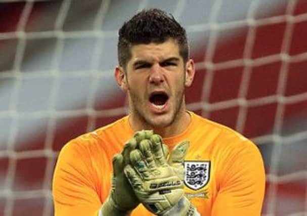 Fraser Forster, pictured in action for England against Chile, has been called up to the World Cup squad. Picture: PA
