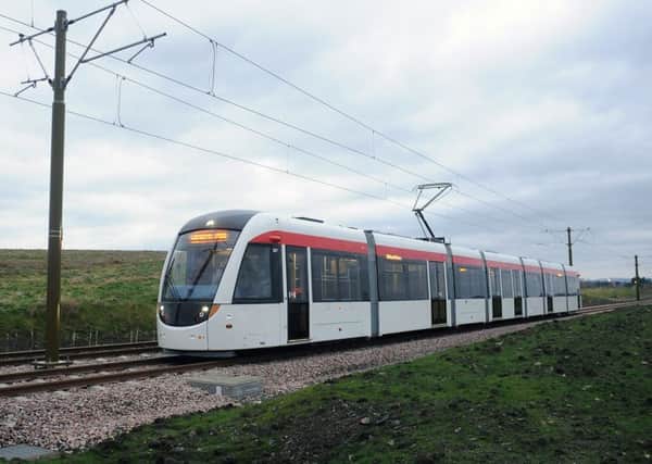 Edinburgh Transport Convener Lesley Hinds and Transport Minister Keith Brown watched a tram being put through its paces in afull speed tram test at Gogar Mains Road on the route to the Airport.Picture: TSPL