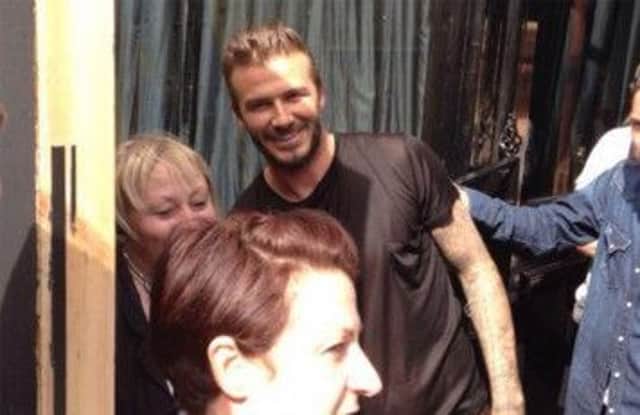 David Beckham poses for photos outside 99 Hanover Street. Picture: Shirley Gatti