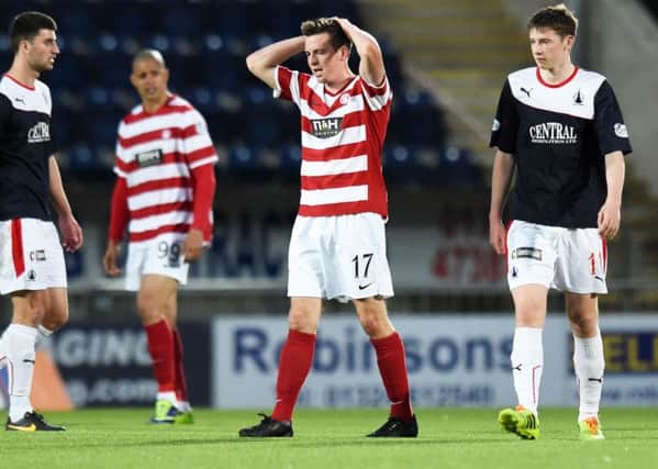 Hamilton's Louis Longridge cuts a dejected figure at full-time after Falkirk had equalisied to draw the tie. Picture: SNS
