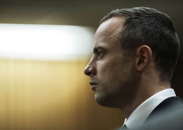 South African Paralympic sprinter Oscar Pistorius pictured in the dock at his trial. Picture: Getty