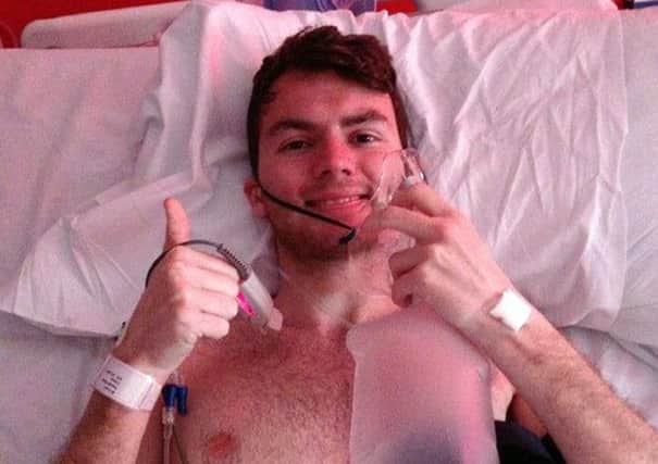 Stephen Sutton, pictured giving the thumbs-up from his hospital bed, has died at the age of 19. Picture: PA
