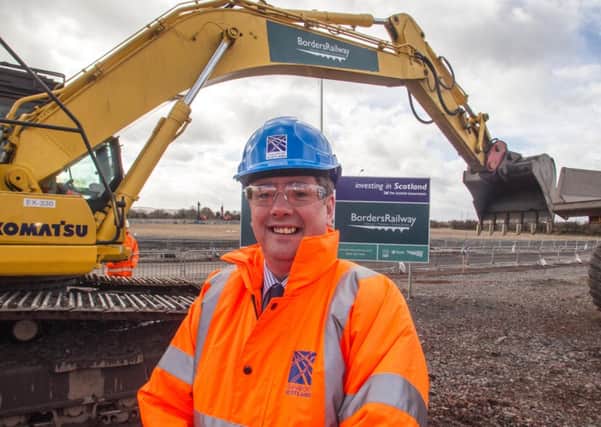 Transport Minister Keith Brown at the site of the Borders Railway track. Picture: Contributed
