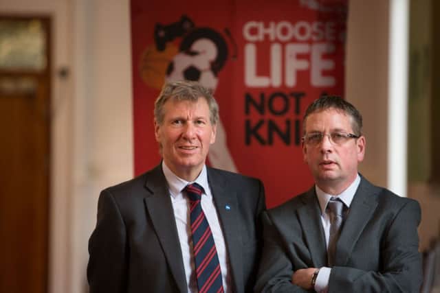 Justice Secretary Kenny MacAskill with Calum Muir, whose daughter was murdered in Whitburn in 2010. Picture: PA