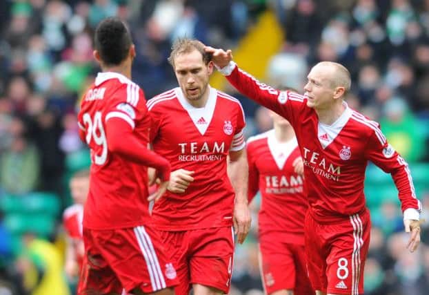 Russell Anderson (centre) is one of three to have signed new deals. Picture: Robert Perry