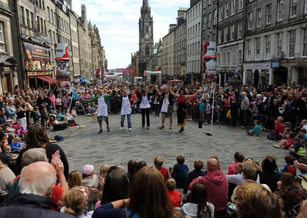 Street performers will be temporarily relocated as the WW1 parade runs down the Royal Mile. Picture: TSPL