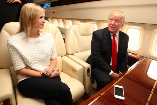 Donald Trump sits in his private jet with daughter Ivanka after arriving at Aberdeen airport fresh from visiting Turnberry. Picture: PA