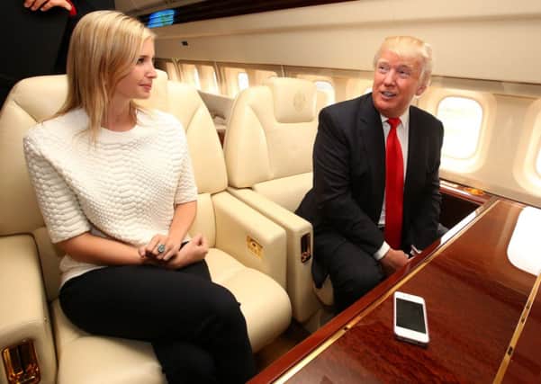 Donald Trump sits in his private jet with daughter Ivanka after arriving at Aberdeen airport fresh from visiting Turnberry. Picture: PA