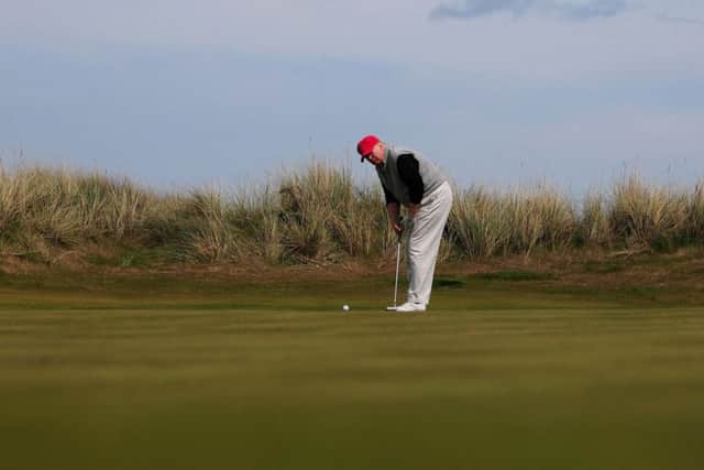 Donald Trump putts at Balmedie yesterday. Picture: Stuart Maxwell/Hemedia