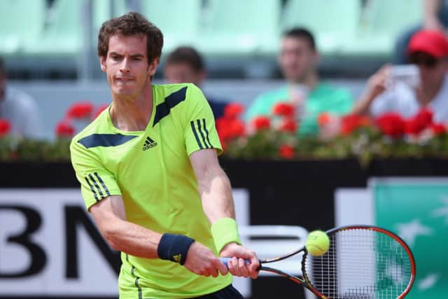 Andy Murray plays a backhand against Jurgen Melzer. Picture: Getty Images