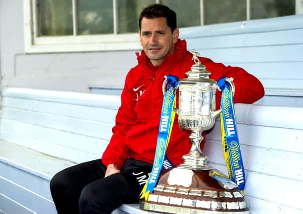 Jackie McNamara isn't looking forward to informing the players not selected for the cup final. Picture: SNS