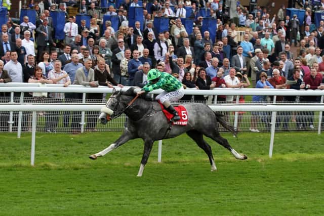 The Grey Gatsby strides out to win the Dante Stakes under Ryan Moore. Picture: PA
