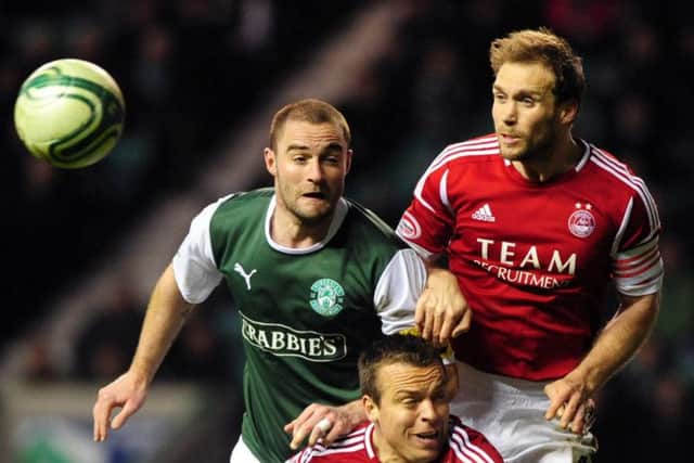 Russell Anderson, right, is pleased Aberdeen recognised his experience with new deal. Picture: Robert Perry