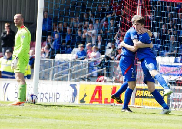 Ryan Christie, right, will extend his stay at Inverness after signing a two-year deal. Picture: SNS