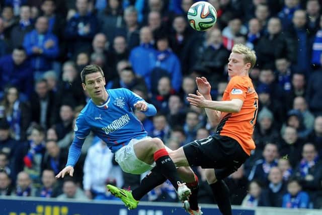 Gary Mackay-Steven challenged Ian Black of Rangers. Picture: Lisa Ferguson