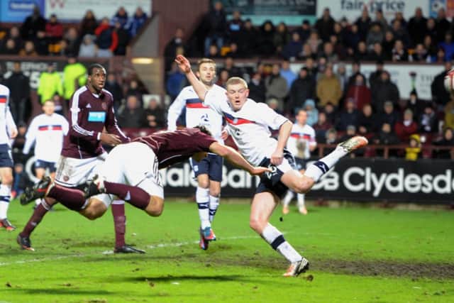 Hearts substitute John Sutton scores the winner during one of the last meetings between the two clubs. Picture: Ian Rutherford
