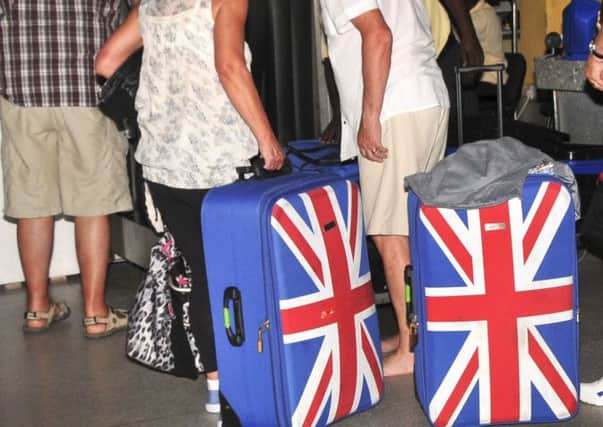 British tourists queue to prepare to leave the international airport in Mombasa, Kenya. Picture: AP