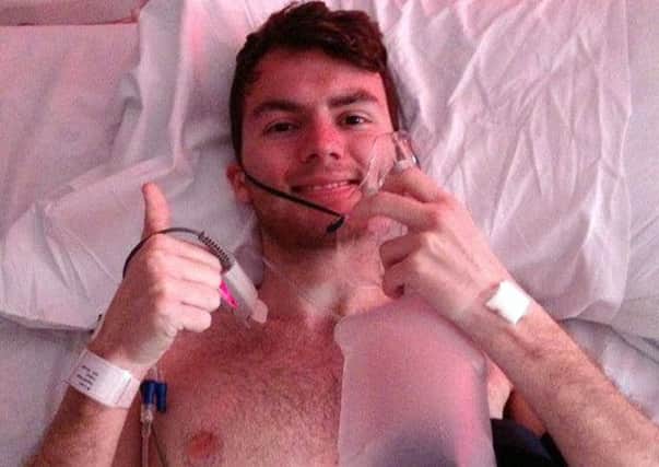 Stephen Sutton gives his supporters the thumbs-up from his bed. Picture: PA