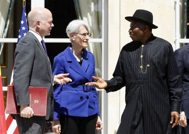 Foreign Secretary William Hague, US. Undersecretary of State for Political Affairs Wendy Sherman and Nigeria's President Goodluck Jonathan. Picture: AP
