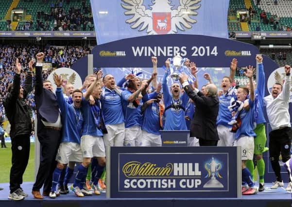 St Johnstone celebrate winning the Scottish cup for the first time in 130 years. Picture: TSPL