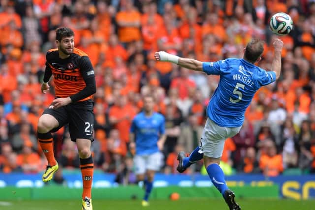 Nadir Ciftci and Frazer Wright battle it out during Saturdays Scottish Cup final. Picture: Getty