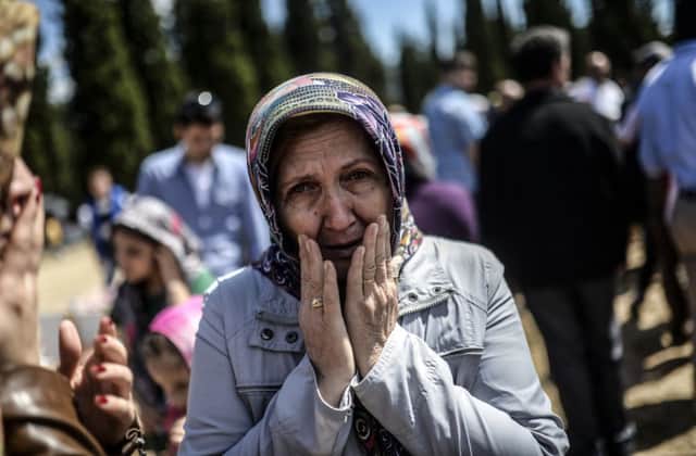 A woman grieves at the cemetery in Soma, Manisa province, where many of the miners killed have been interred. Picture: Kilic Bulent/Getty