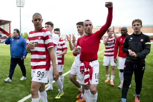 Hamilton star Darian McKinnon salutes the fans at full-time after the 1-0 win against Falkirk. Picture: SNS