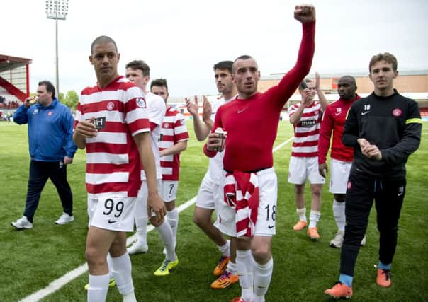 Hamilton star Darian McKinnon salutes the fans at full-time after the 1-0 win against Falkirk. Picture: SNS