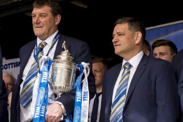 St Johnstone manager Tommy Wright, left, and chairman Steve Brown soak up their success. Picture: SNS