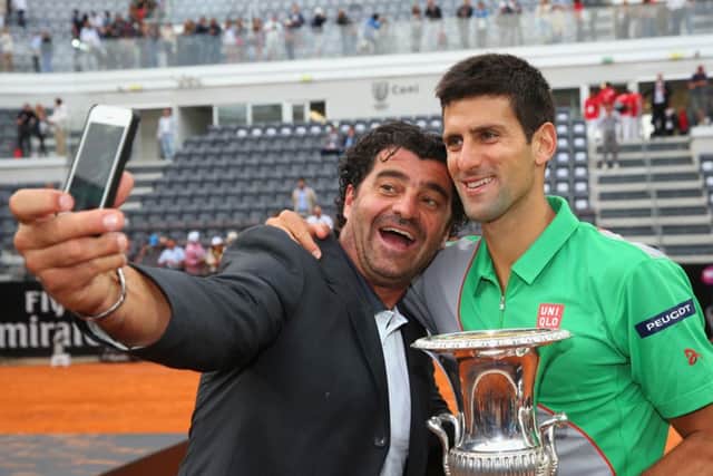 Italian skiing legend Alberto Tomba takes a selfie with Novak Djokovic after the Serb defeated Rafael Nadal in Rome. Picture: Getty
