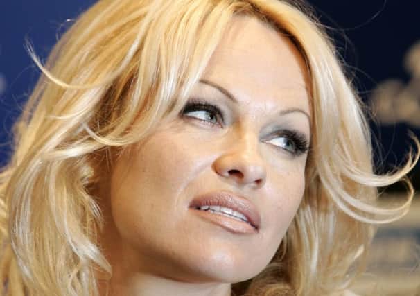 File photo of Pamela Anderson, who revealed she had been abused as a child. Picture: AP