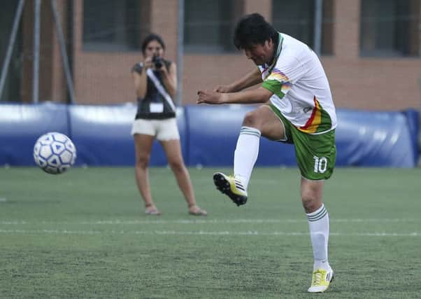 President Morales, pictured playing football in September 2013. Picture: AP