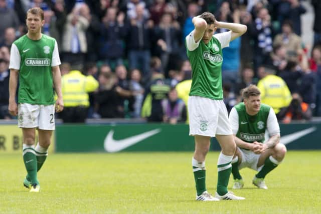 Jordon Forster, Alex Harris and Michael Nelson are a picture of dejection after the defeat to Kilmarnock. Picture: SNS
