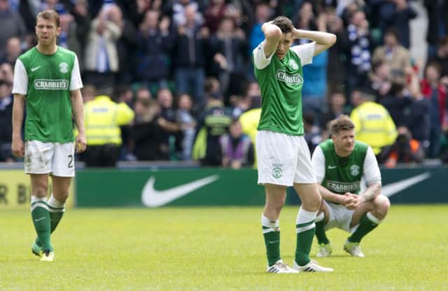 Jordon Forster, Alex Harris and Michael Nelson are a picture of dejection after the defeat to Kilmarnock. Picture: SNS