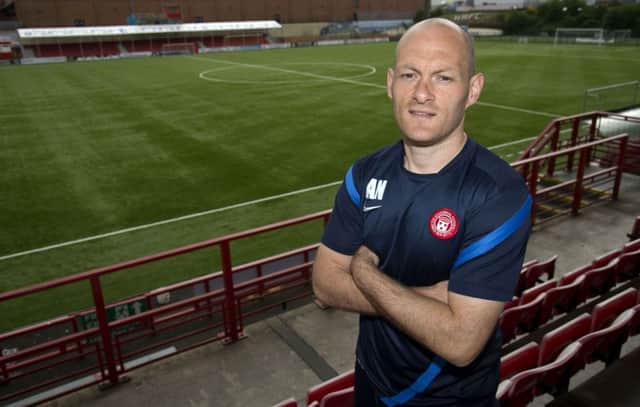 Alex Neil, pictured at New Douglas Park, is hoping to take advantage of the pressure on Hibs. Picture: SNS