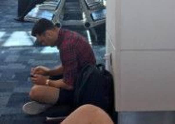 Kaymer sitting on the airport floor after his big win. Picture: Twitter