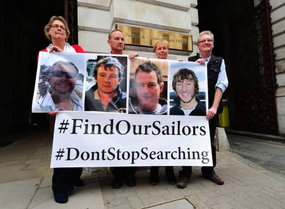 Friends and family of the sailors missing in the Atlantic at the Foreign and Commonwealth office. Picture: PA