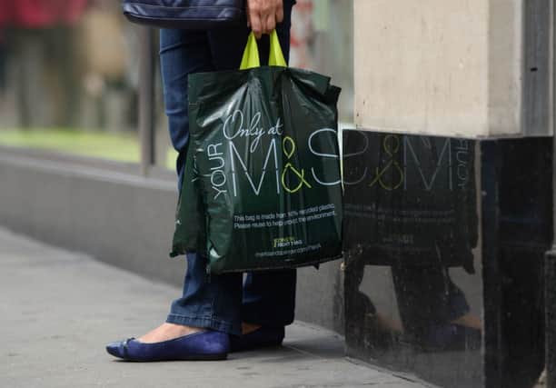 A majority back mandatory charging for carrier bags. Picture: PA