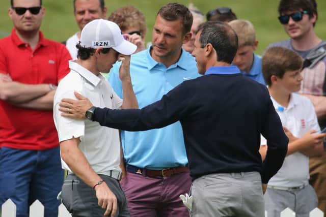 Rory McIlroy chats to former footballers Andriy Shevchenko and Gianfranco Zola at Wentworth. Picture: Getty
