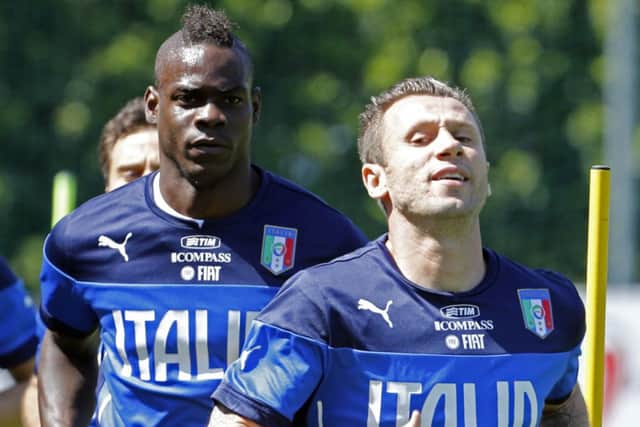 Mario Balotelli, left, trains with his Italy team-mates at their base in Florence yesterday. Picture: Reuters