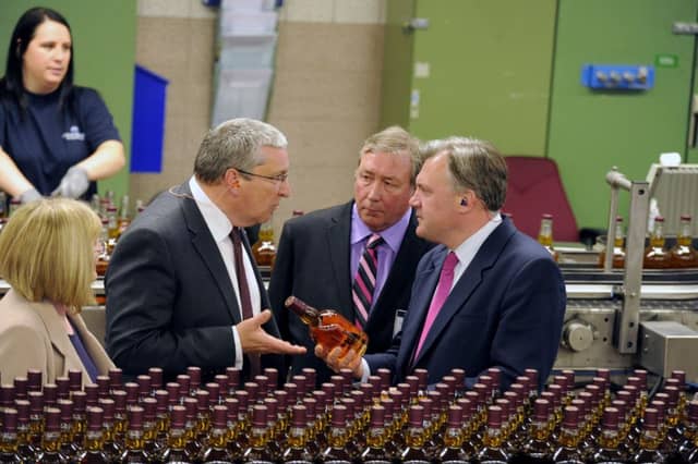 Labour shadow chancellor Ed Balls, right, visits the Chivas Brothers bottling hall in Paisley yesterday. Picture: John Devlin
